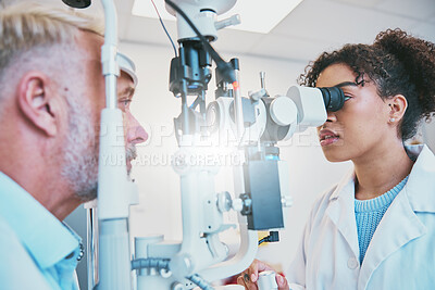 Buy stock photo Consulting, ophthalmology and eye exam with doctor and patient for vision, healthcare and medical. Innovation, optometry or optic test with senior man and black woman for results, advice and study