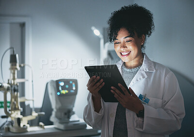 Buy stock photo Tablet, medical doctor and black woman in hospital for online consultation, research or telehealth at night. Healthcare clinic, technology and happy female physician with touchscreen for wellness app