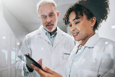 Buy stock photo Doctors, tablet and clinic, health team and communication, digital medical document or test results. Partnership, window and senior man with black woman, conversation and technology in healthcare