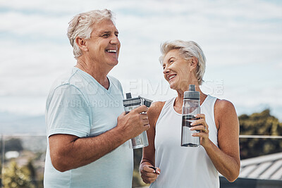 Buy stock photo Senior couple, fitness and water bottle with smile for hydration or thirst after workout, exercise or training in nature. Happy elderly man and woman smiling for natural refreshment from exercising