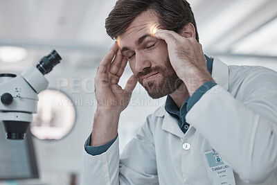 Buy stock photo Stress, doctor or scientist with headache in a laboratory suffering from burnout, migraine pain or overworked. Exhausted, frustrated or tired man working on science research with fatigue or tension