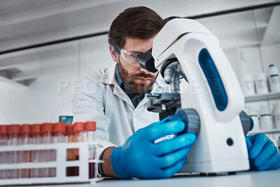 Buy stock photo Working in laboratory, man studying chemical dna in test tube and research scientific biotechnology in Germany. Pathology scientist, liquid solution and microscope focus on career in medical science