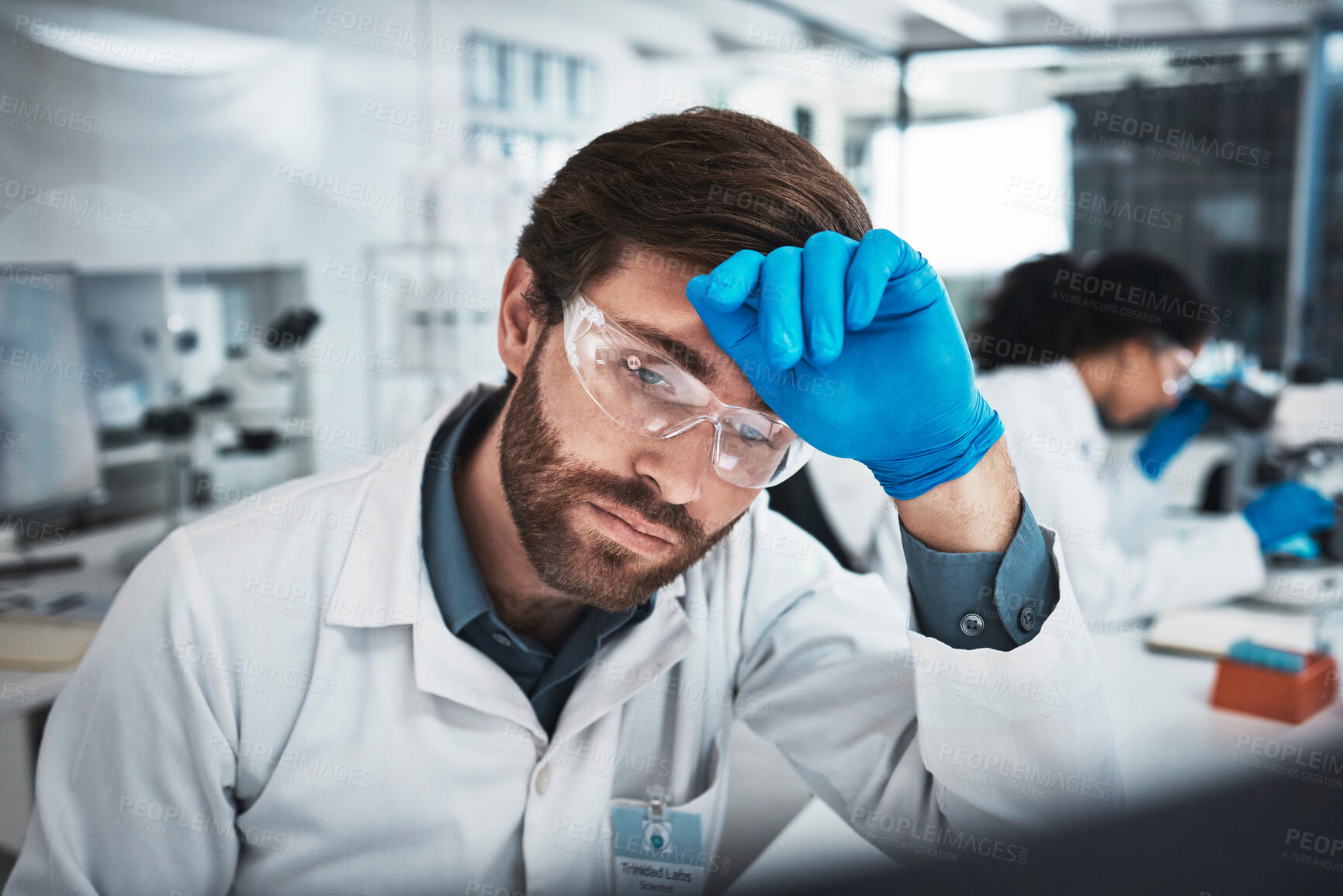 Buy stock photo Tired man, doctor and scientist with headache at night suffering from burnout, stress or overworked in the lab. Exhausted male in science research, stress or thinking while working late in laboratory