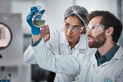 Buy stock photo Medical, team work or scientists in laboratory with chemical liquid after science research or scientific testing. Physics analysis, study or doctors checking acid solution for medicine development