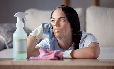 Buy stock photo Spray bottle, tired and woman in lounge, thinking and cloth with depression, stress and overworked. Female cleaner, maid and lady in living room, disinfectant and spring cleaning home, rag or burnout