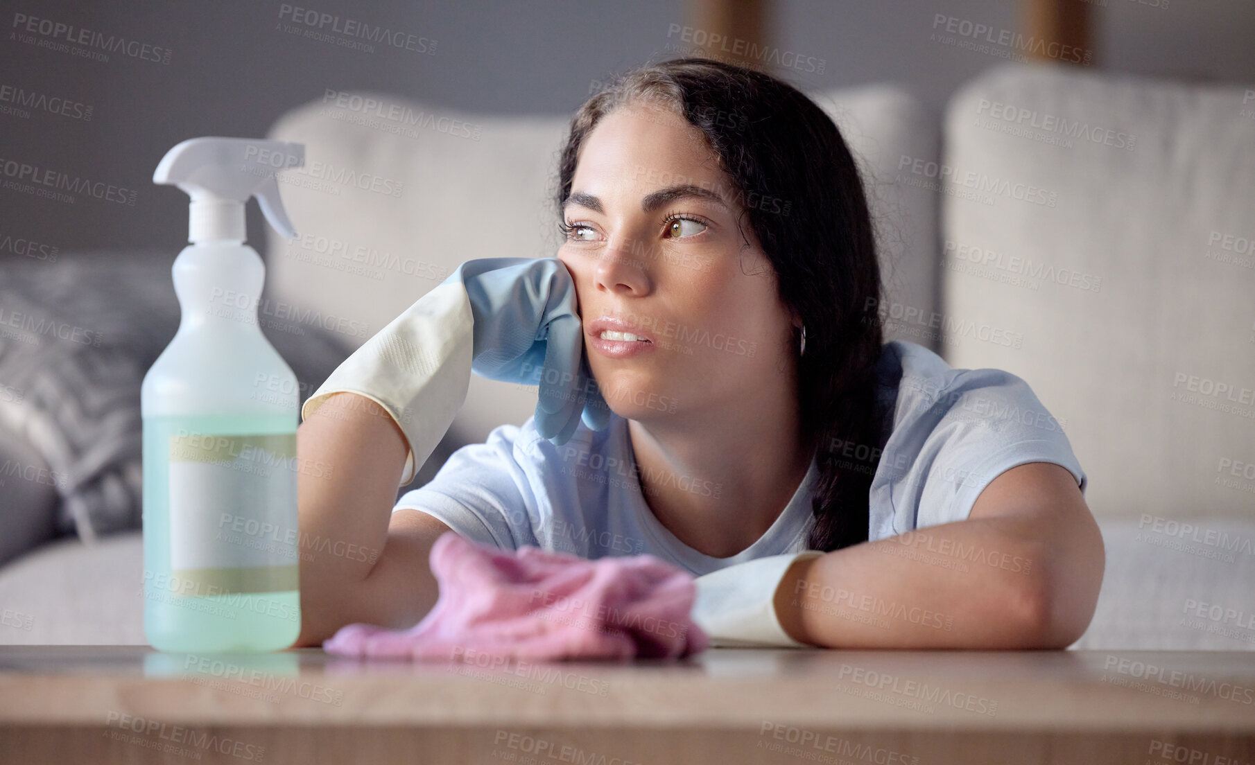 Buy stock photo Spray bottle, tired and woman in lounge, thinking and cloth with depression, stress and overworked. Female cleaner, maid and lady in living room, disinfectant and spring cleaning home, rag or burnout