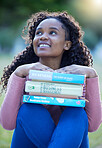 Books, park and black woman thinking of university dream, study goals and reading knowledge in business college. Young person or student with textbook on campus for scholarship, exam and education
