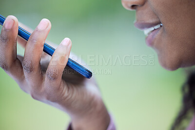 Buy stock photo Voice memo, black woman hand and face zoom outdoor on mobile connection and virtual note record. Online conversation and speaking of a young person listening to audio with a smile from communication