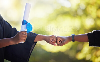 Buy stock photo Graduation, education and hands of friends fist bump in celebration of certificate, study and success on bokeh. University, people and hand in support of goal, motivation and unity in accomplishment