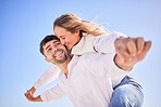 Freedom, piggyback and couple on adventure date for romance, valentines day or anniversary. Romantic, happy and young man and woman having fun together while on a weekend trip or holiday in Australia