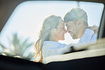 Couple, love and hug in window for travel, road trip and adventure with car for transport outdoor. Happy face of man and woman with love, care and security on vacation, journey or holiday in summer