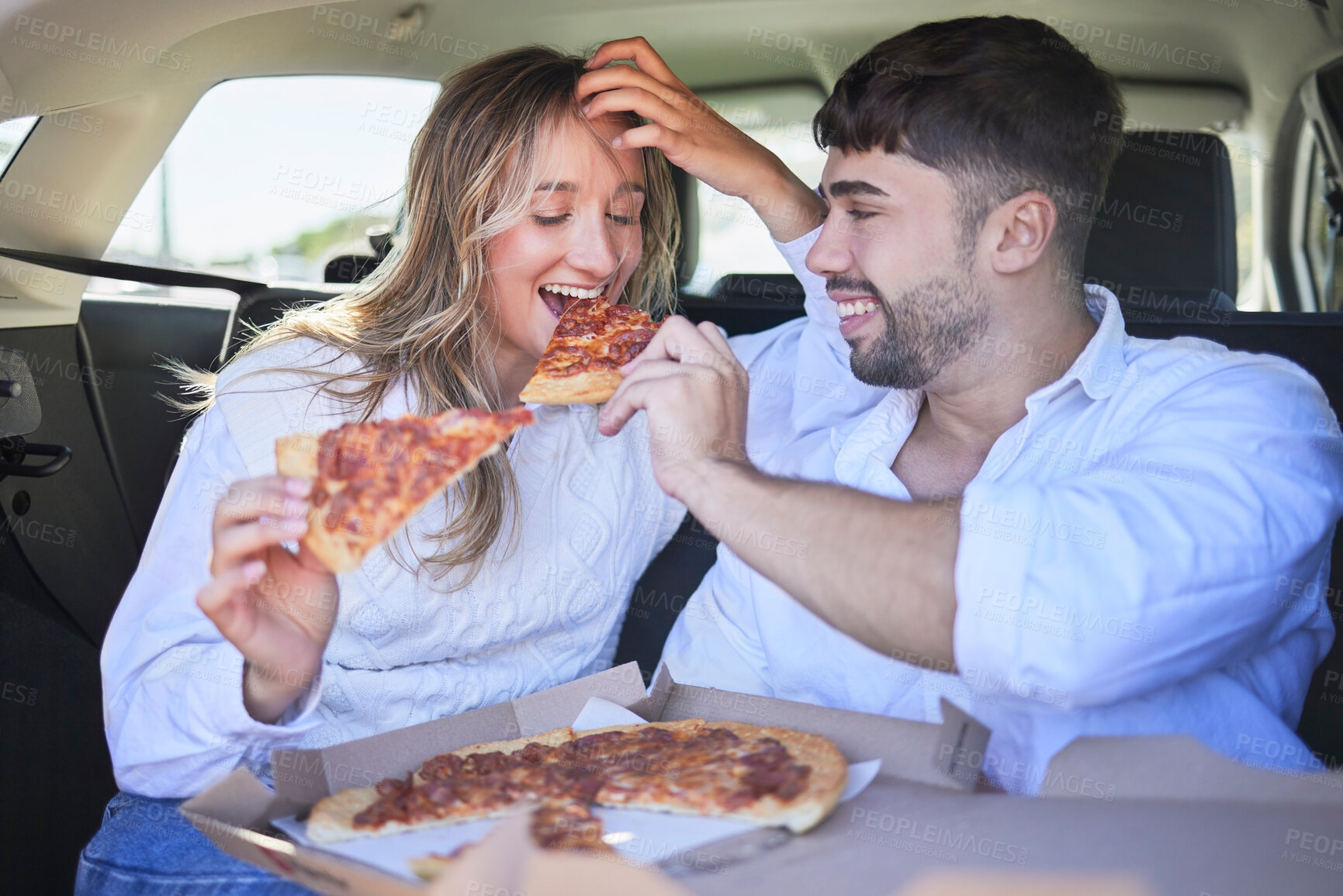 Buy stock photo Pizza, love couple eating on a road trip on holiday vacation or romantic lunch date to in a car or vehicle. Travel, fast food or woman bonding enjoying a fun memory a happy partner in summer romance 