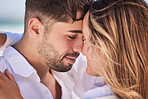 Love, forehead or couple relax on holiday vacation or romantic honeymoon to celebrate marriage commitment. Embrace, trust or woman bonding or hugging a happy partner in fun summer romance in peace