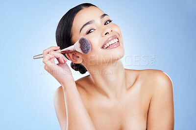 Buy stock photo Makeup brush, beauty and portrait of woman with smile on blue background for cosmetics, powder and foundation. Skincare, facial and girl face with cosmetology tools for products, salon and treatment