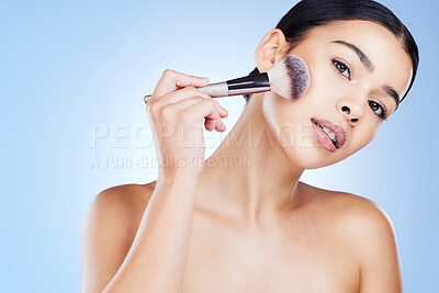 Buy stock photo Makeup, brush and portrait of woman with beauty, cosmetics and cheek powder of foundation product in studio. Female model, facial tools and cosmetics application for glow, shine or aesthetic makeover