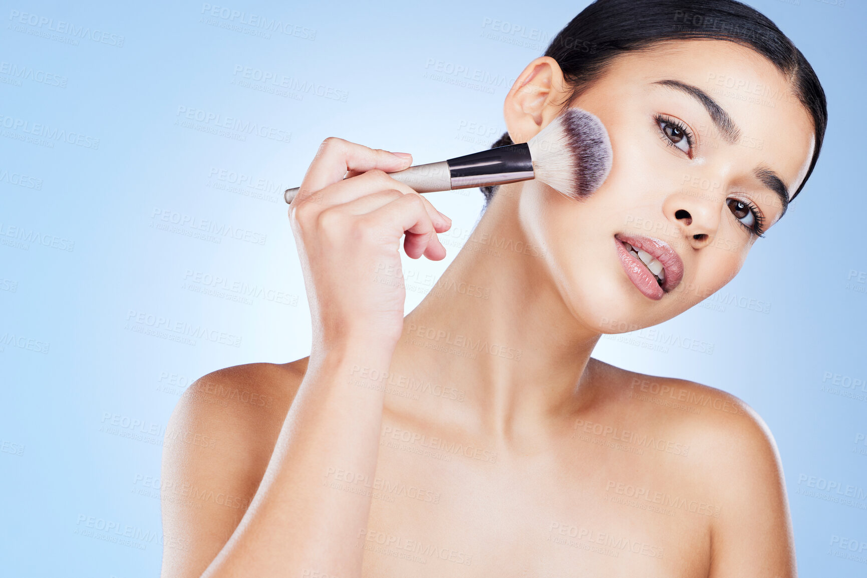 Buy stock photo Makeup, brush and portrait of woman with beauty, cosmetics and cheek powder of foundation product in studio. Female model, facial tools and cosmetics application for glow, shine or aesthetic makeover