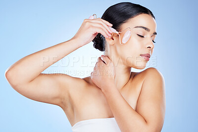 Buy stock photo Beauty, skincare and jade roller with face of woman for massage, product and facial wellness. Relax, dermatology and cosmetics with girl model and grooming tool for health, lifting or morning routine