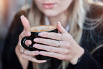 Coffee cup, woman hands with art for customer services, restaurant creativity and hospitality industry with inspiration. Cafe shop with person hand holding espresso, cappuccino or latte drink