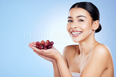 Buy stock photo Grape, woman and portrait for face skincare, cosmetics or food product on studio background. Happy young model, grapeseed fruit and oil of nutrition, vegan diet or detox wellness of natural aesthetic