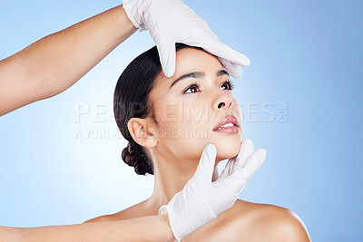 Buy stock photo Face, plastic surgery and doctor hands on woman for beauty, filler and change in studio. Aesthetic model person and surgeon for cosmetic facial transformation or dermatology on gradient background 