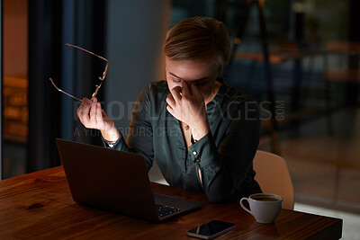 Buy stock photo Tired, dark and woman with a headache, laptop and burnout from work stress in the office. Business, migraine and employee with pain from reading an email at night, overtime problem and anxiety