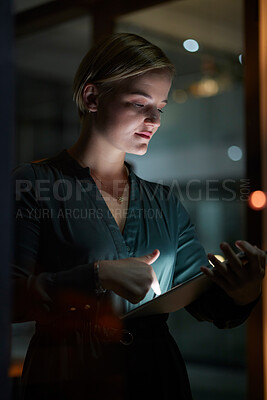 Buy stock photo Dark, tablet and woman is working overtime in late in the evening in a modern office for a startup company. Person, internet and female entrepreneur typing online in a blackout due to power cut
