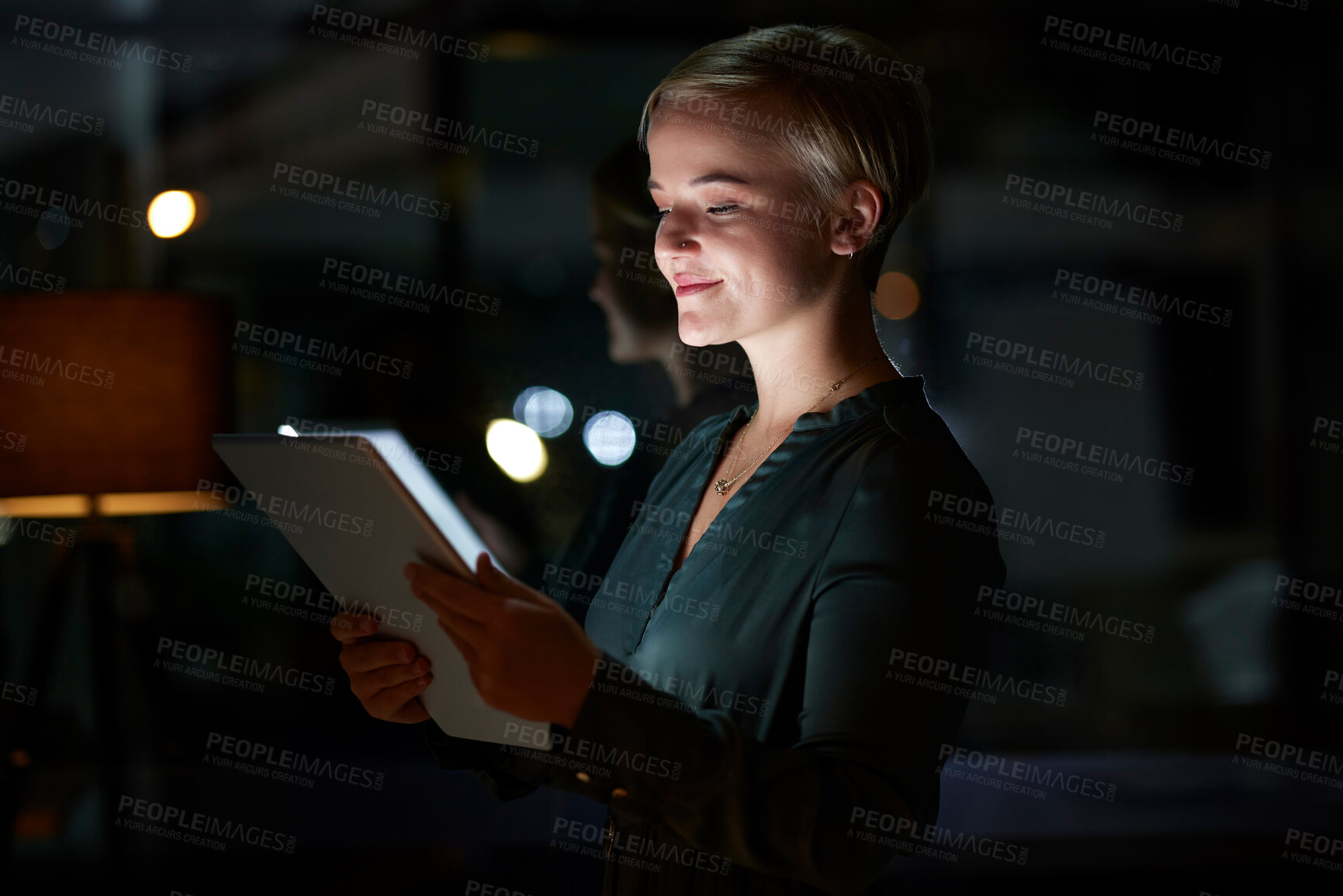 Buy stock photo Work, overtime and woman with tablet, smile and internet search, working late on digital design project. Dark night at office, designer at in creative startup reading online market research report.