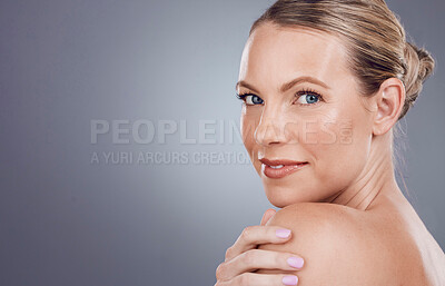 Buy stock photo Beauty, face and skin with woman in portrait, facial with mockup space and dermatology in studio background. Cosmetic care, model and wellness with natural cosmetics treatment and skincare shine