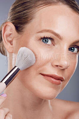 Buy stock photo Face, makeup brush and woman in portrait, beauty and skin glow with lashes and foundation on studio background. Powder, cosmetics tools and skincare with shine, cosmetology and cosmetic care zoom