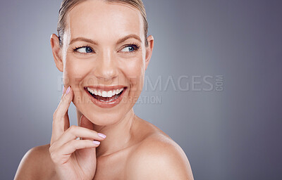 Buy stock photo Beauty, face and woman, facial and skincare with hand and dermatology on studio background. Cosmetic care, happy model and healthy skin with smile, natural cosmetics and wellness with mockup space