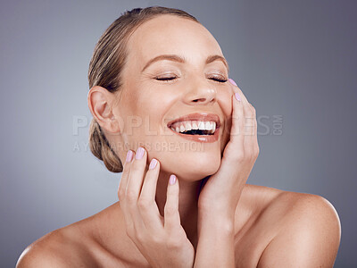 Buy stock photo Beauty, woman and laughing in studio for skincare, laser dermatology and wellness cosmetics on background. Happy female model touch face for aesthetic glow, shine and healthy facial transformation 