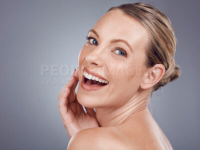 Buy stock photo Beauty, face and woman laughing in portrait with hand touching facial, dermatology and skincare on studio background. Cosmetic care, happy model and skin, natural cosmetics and wellness with mockup