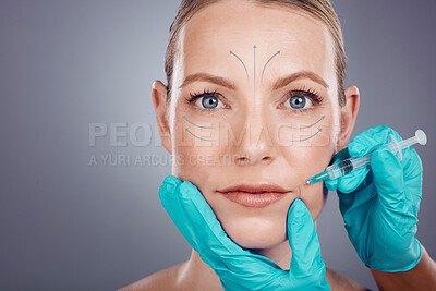 Woman, studio portrait and lip filler injection for plastic surgery, cosmetics and beauty by gray background. Model, anti aging and headshot with skincare, writing and face transformation by surgeon