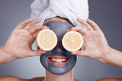 Buy stock photo Lemon, skincare mask and woman with healthy face, beauty makeup and cleaning wellness in studio. Happy female model, citrus fruits and vitamin c for aesthetic facial, glow or dermatology smile