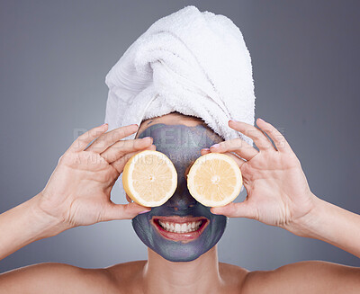 Buy stock photo Lemon, face mask and woman cover eyes for healthy skincare, beauty and anti aging wellness makeup in studio. Happy female model, citrus fruits and vitamin c for aesthetic facial, shower glow or smile