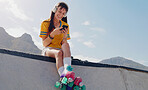 Smile, phone and music with woman and rollerblades for skating, streaming and social media app. Technology, headphones and sports with girl in skate park for internet, mobile radio and fitness