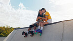 Roller skate, smartphone and black man with woman, outdoor and conversation after training, relax and rest. Skaters, male and female with cellphone, talking and connection for social media and happy 