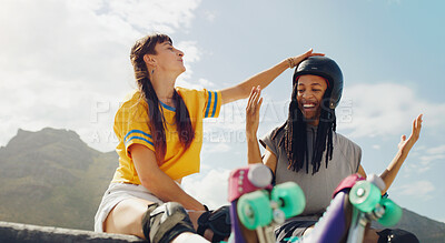 Buy stock photo Fun, playful and interracial couple rollerskating at a park, helping with helmet and gear in Brazil. Happy, laughing and man and woman getting ready to skate while bonding, talking and active