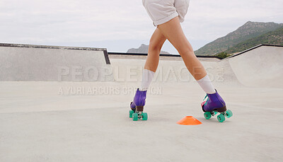 Buy stock photo Fitness, skating and roller skates with shoes of woman in skate park for training, hobby and freedom. Summer, sports and speed with girl skater and challenge course with cones for exercise or workout