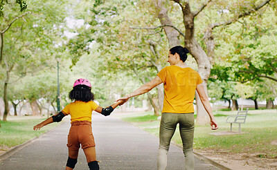 Buy stock photo Mother, child and skating with roller skates at nature park for exercise, balance and freedom. Woman and black girl kid or family outdoor to play with helmet for safety, trust and love in summer