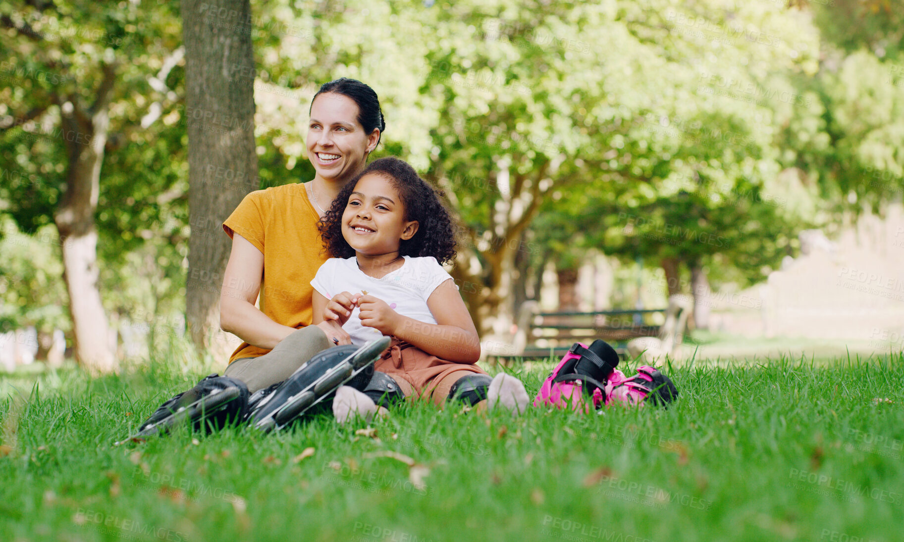 Buy stock photo Family, mother and kid in park with rollerblading outdoor, relax on grass and fun in nature with happy people. Woman, girl and taking a break, sports and quality time together with love and care