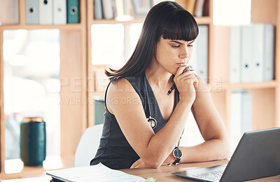 Buy stock photo Laptop, thinking doctor and woman in hospital looking for solution to healthcare problem. Ideas, computer or female medical physician reading, focus or planning, confused or doubt while contemplating
