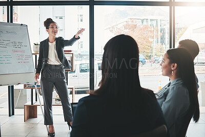 Buy stock photo Businesswoman, coaching and whiteboard in FAQ, presentation or leadership at office workshop. Female leader, coach or mentor speaking in staff training for marketing, planning or corporate strategy