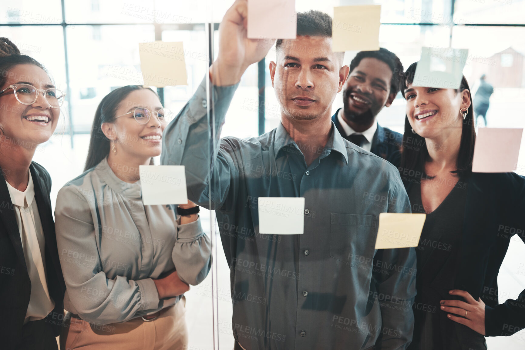 Buy stock photo Planning, brainstorming and business team in a meeting of strategy development at a startup company in the office. Leader, founder and businessman doing a presentation in teamwork with sticky note