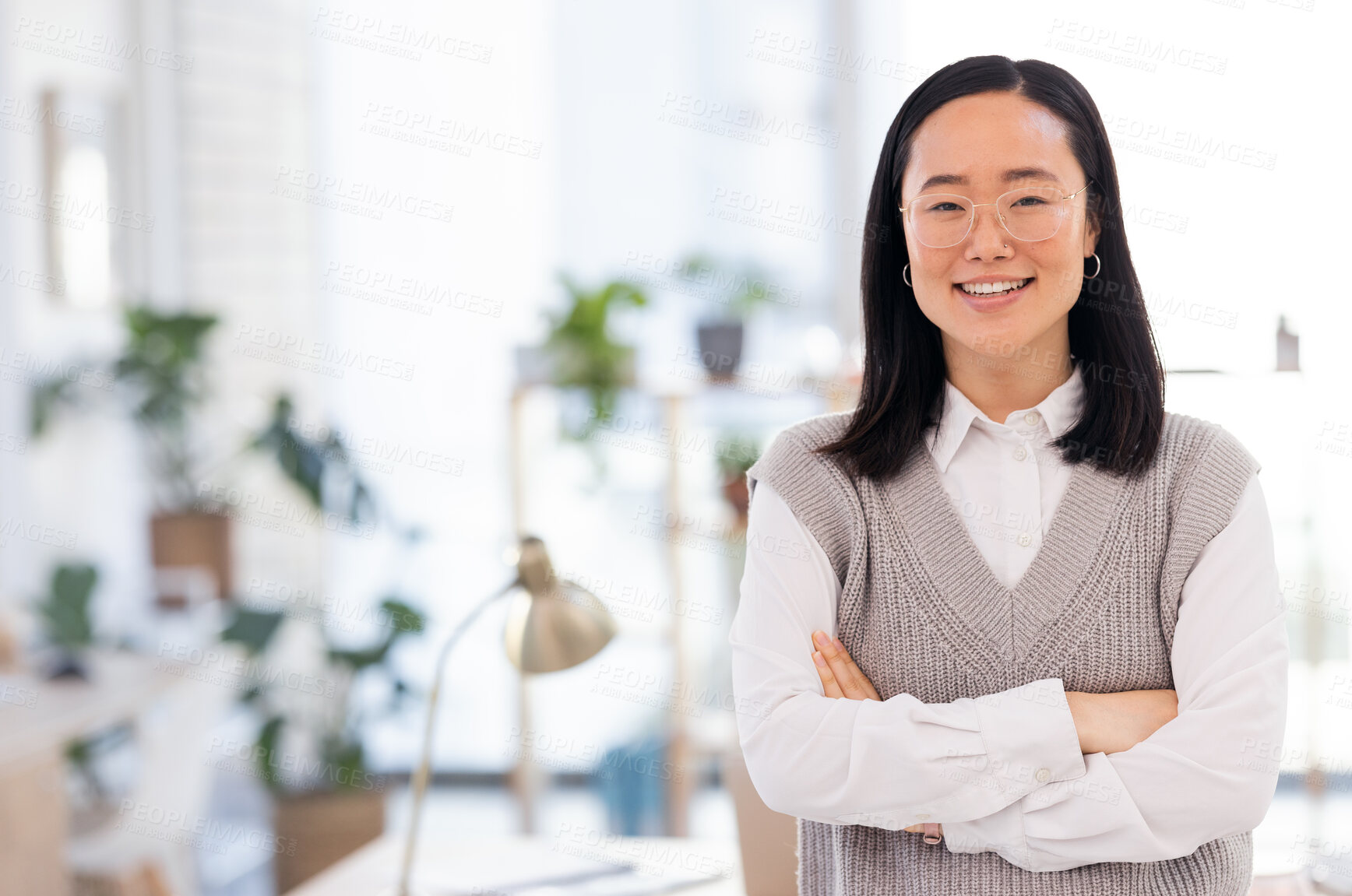 Buy stock photo Asian woman, portrait and arms crossed at startup with smile, leadership and focus for seo management. Young executive, social media manager and modern office for goals, vision and confident in Tokyo