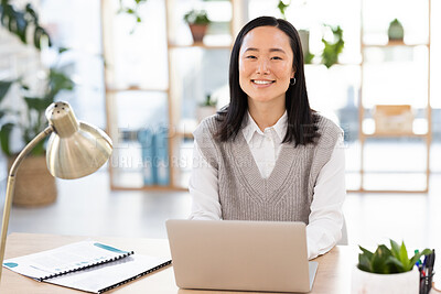 Buy stock photo Asian woman, portrait and laptop at startup with smile, planning and focus seo management. Young executive, social media manager and computer in modern office for schedule, analysis and networking