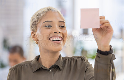 Buy stock photo Writing, planning and happy black woman in office for schedule, agenda and management with sticky note. Smile, face and female leader with idea for marketing, advertising or career goal or mission