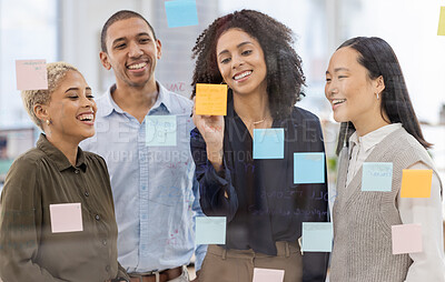 Buy stock photo Writing, collaboration and teamwork by business people in meeting for planning, idea and goal on sticky note in office. Team, schedule and diversity by group for mission, strategy or problem solving