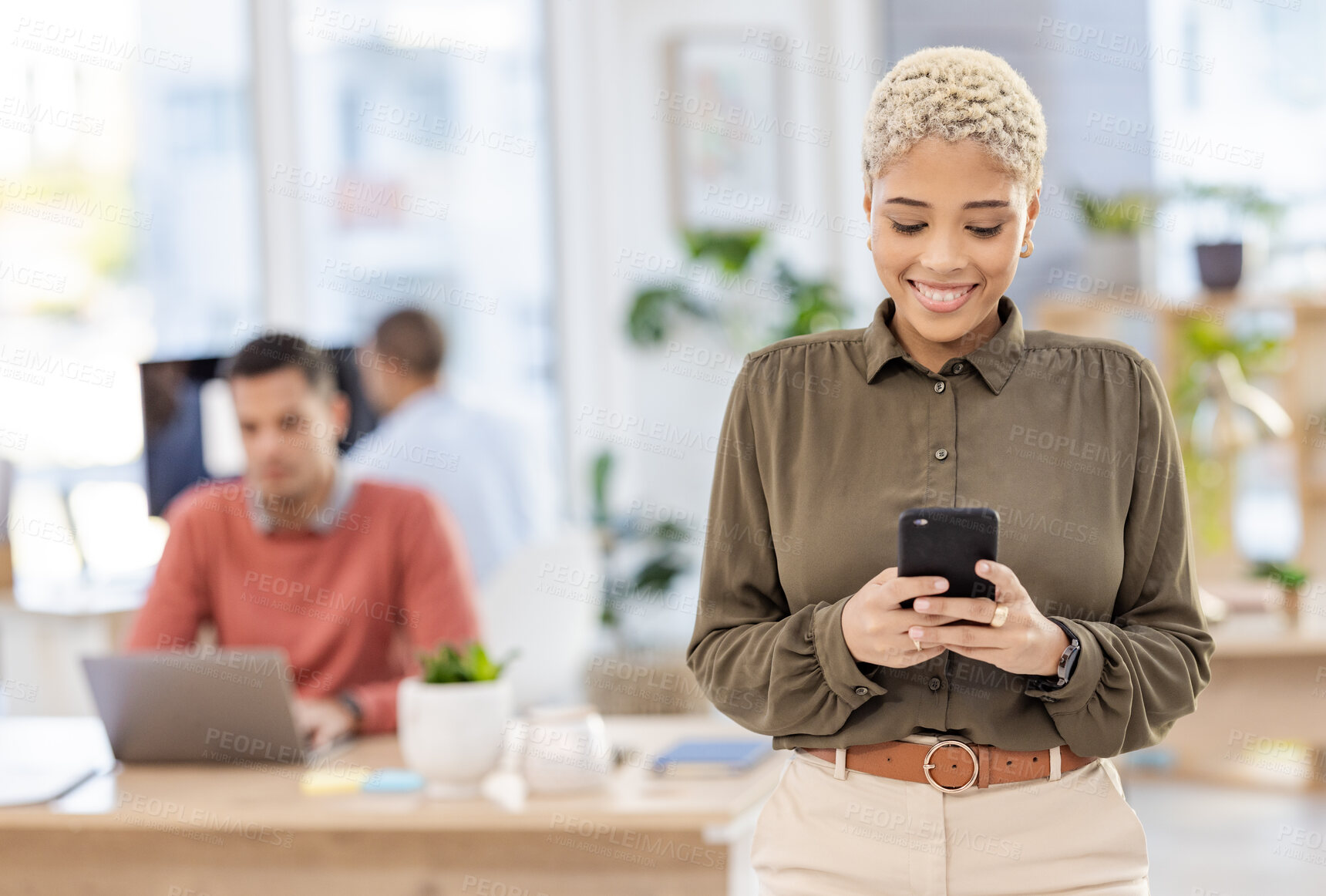 Buy stock photo Black woman in business, smartphone and communication in workplace, reading post and mockup with smile. Meme online, social media manager and content creator for startup, creative and connectivity
