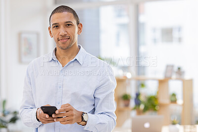 Buy stock photo Phone, office and portrait of businessman browsing on the internet, social media or mobile app. Technology, professional and male corporate employee reading information on cellphone in the workplace.